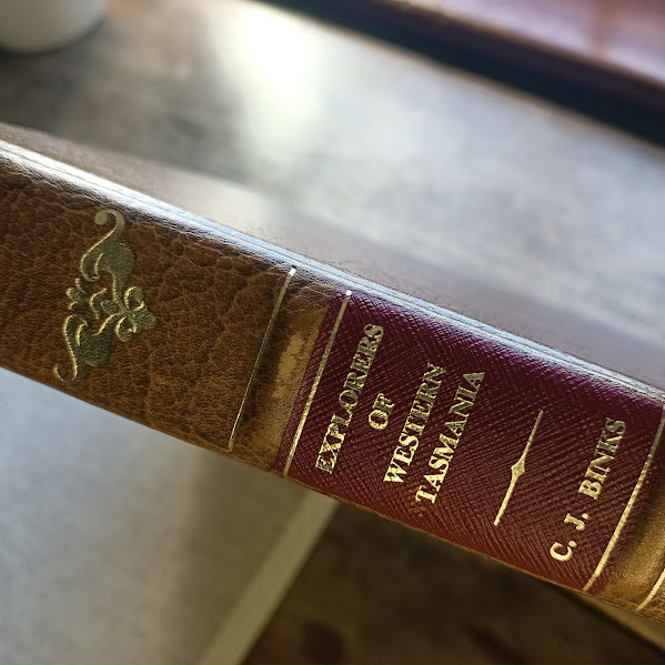 Rubbing on spine of Explorers of Western Tasmania leatherbound edition