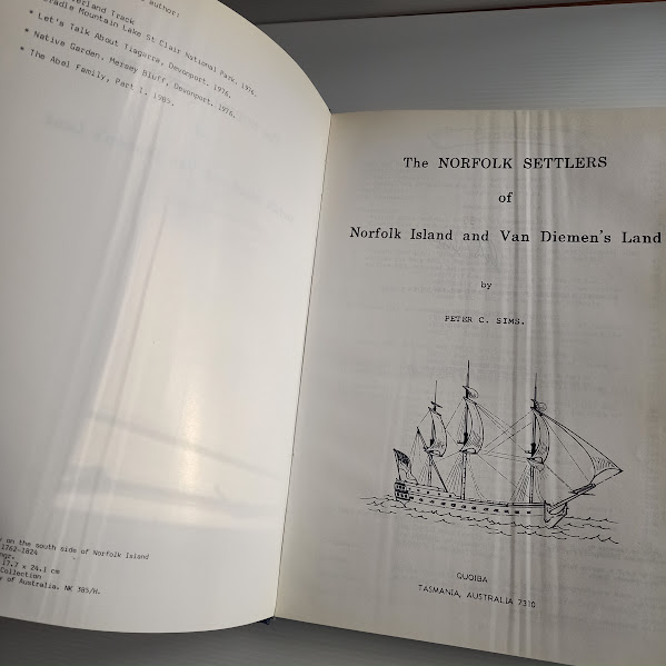 Creased pages of The Norfolk Settlers - title page