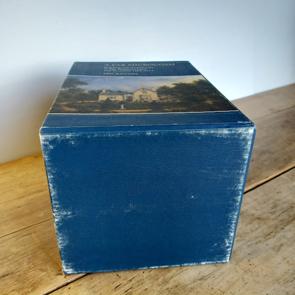 Rubbed based of slipcase for Far Microcosm set of Tasmanian architectural history