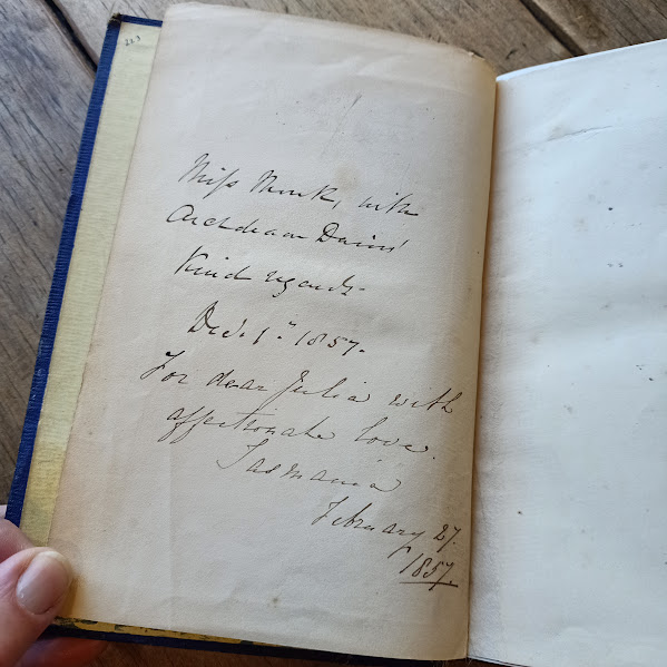 Handwritten 1857 presentation inscription from Archdeacon Davies inside The Cruise of the Beacon