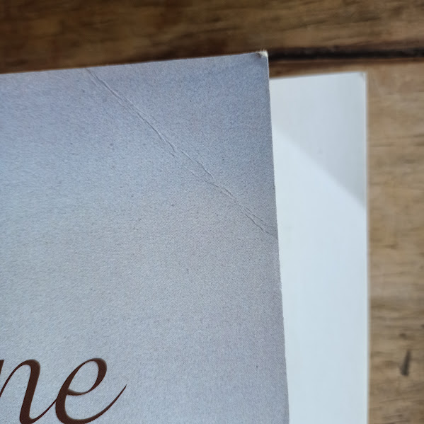Huon Pine Story softcover bent corner