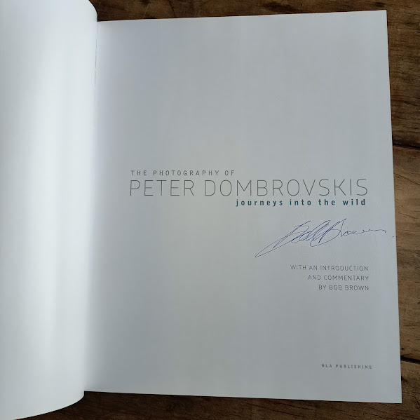 Journeys into the Wild Photography Dombrovskis signature